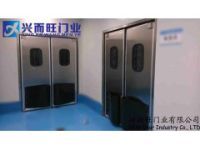 供應(yīng)唐山不銹鋼自由防撞門 興而旺門業(yè)定做安裝行業(yè)